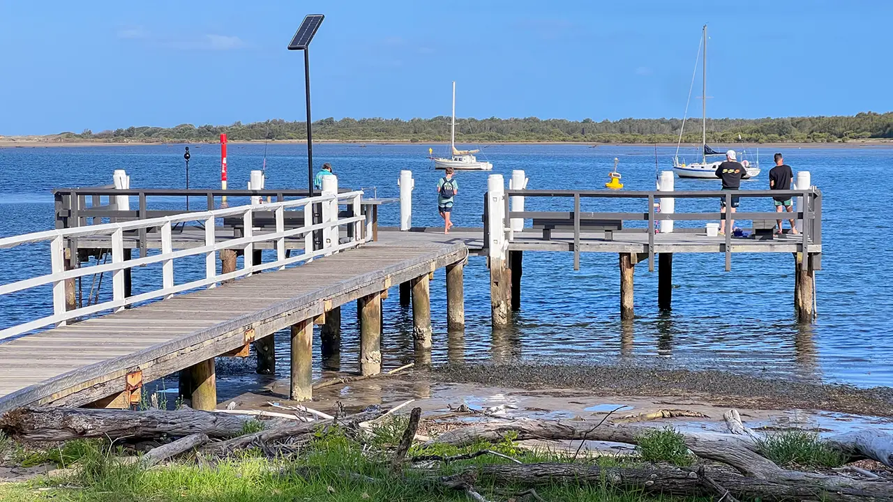 Fishing on the wharf, Shoalhaven Heads, NSW, Australia